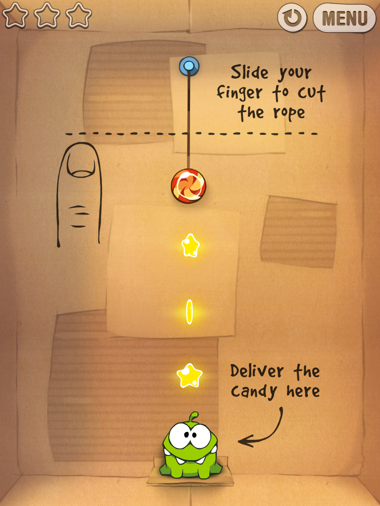 Das kleine Monster möchte mit dem Bonbon gefüttert werden. 